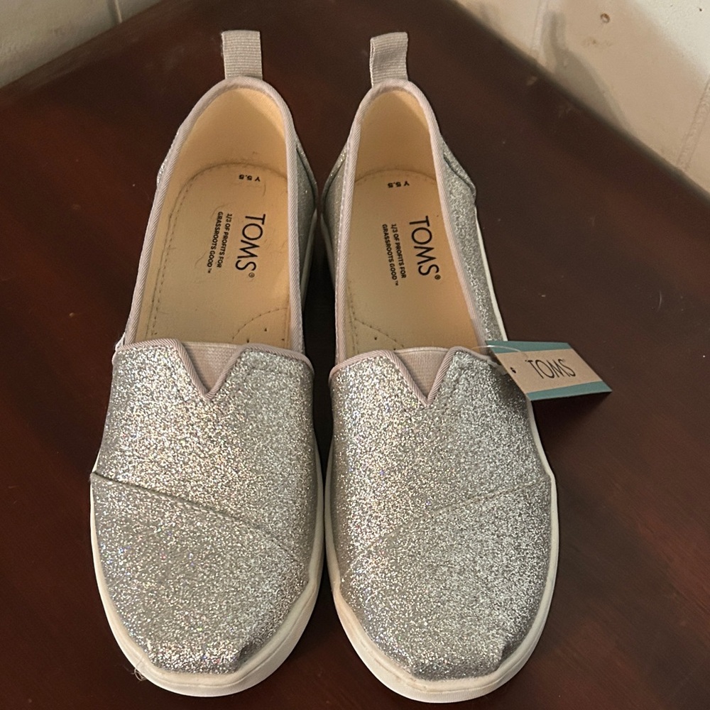 TOMS Shimmering Silver Slip-Ons